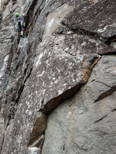 New Route -  Steve Charlton on 'Just About to Rock' - Photo by Aric Fishman