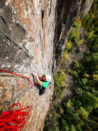 Andy Noga pulling the final crux on pitch 2 - Photo by Aric Fishman
